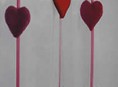 imagen Cortinas con detalle de corazones enlazados