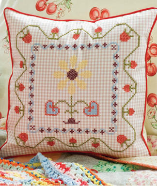 Almohadon decorativo en punto cruz 1