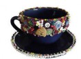 imagen Taza decorada con botones, mostacillas y conchas marinas